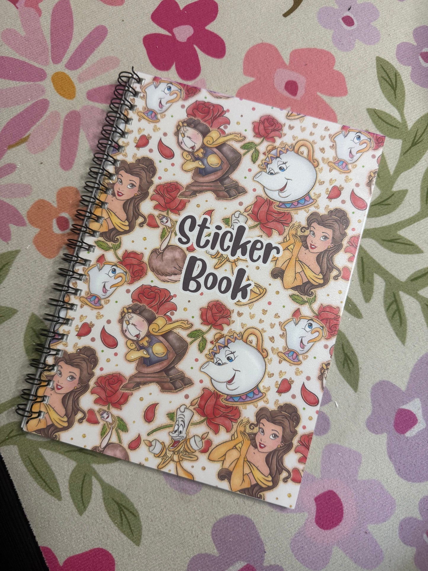 Sticker book with cartoon characters on a floral background
